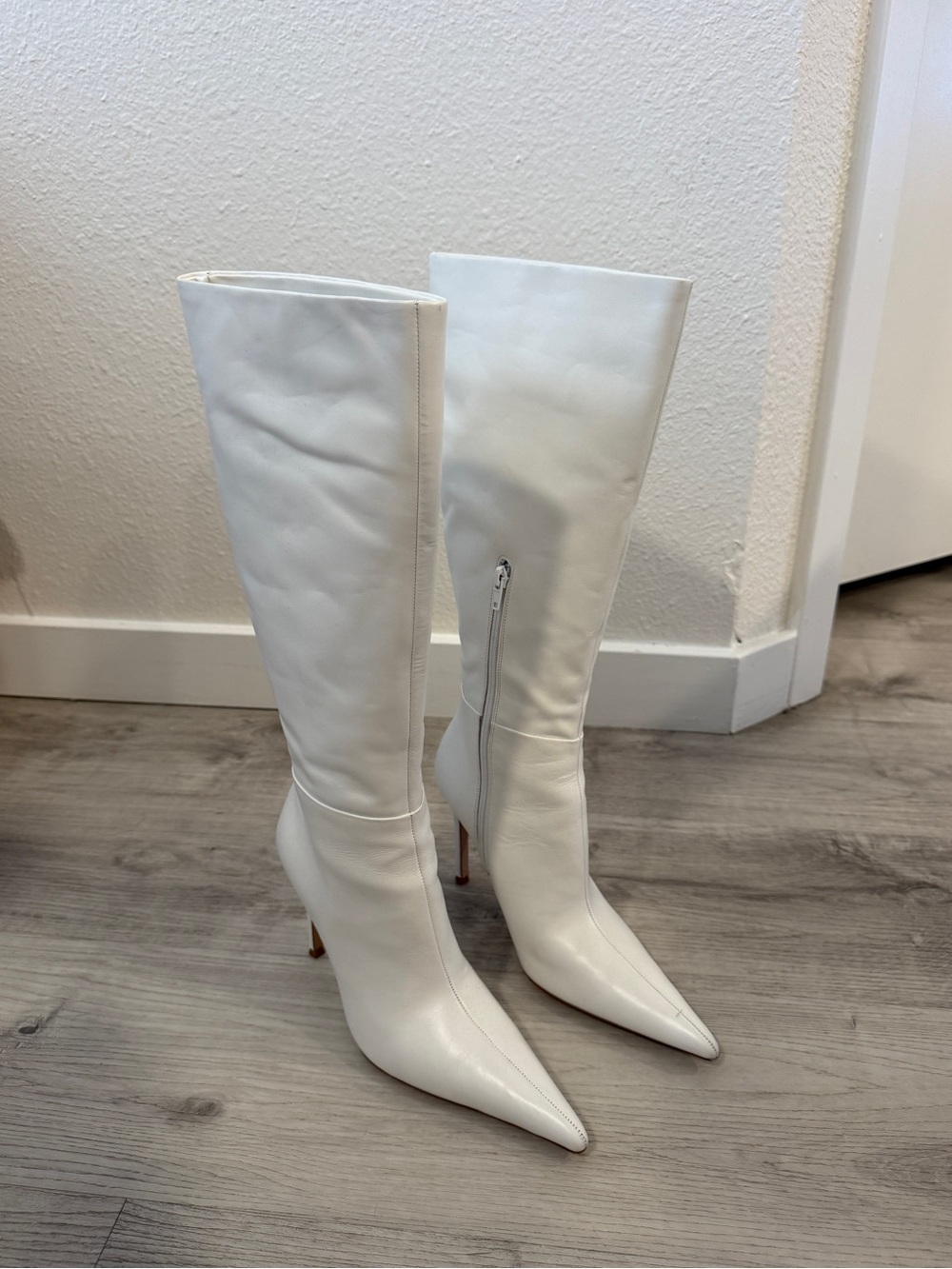 White knee high boots